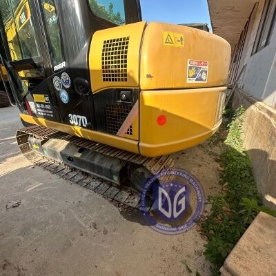 Używany grabarz Caterpillar CAT307D kompaktowy wydajny gotowy do pracy